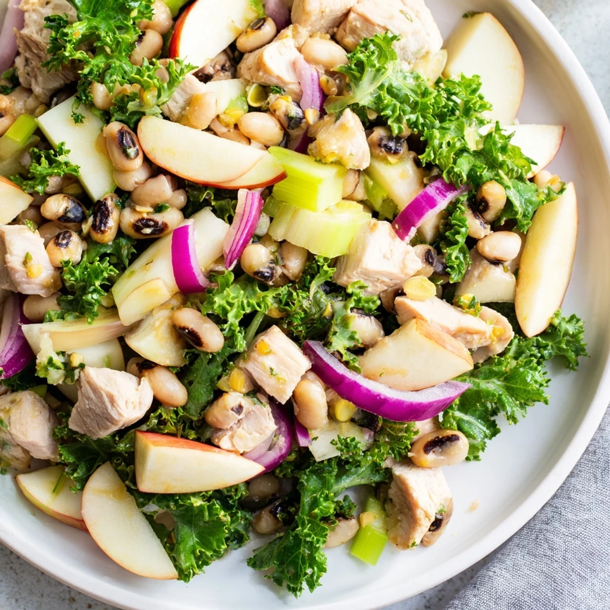 Top view of the delicious Chicken and Apple New Years Luck Salad with toasted pecans, perfect for a festive meal.