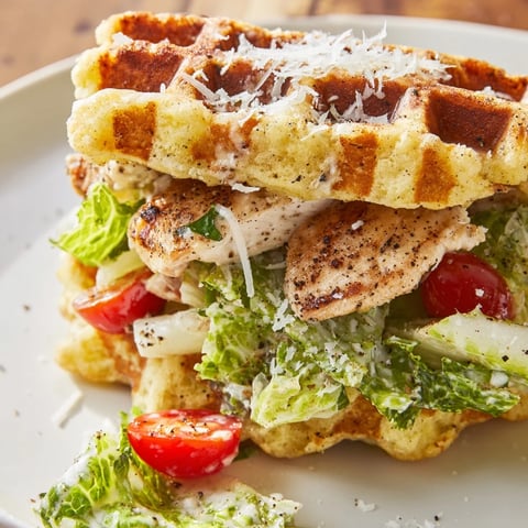 Here are the requested ALT texts for a recipe photo of Chicken Caesar Waffle Sandwiches: