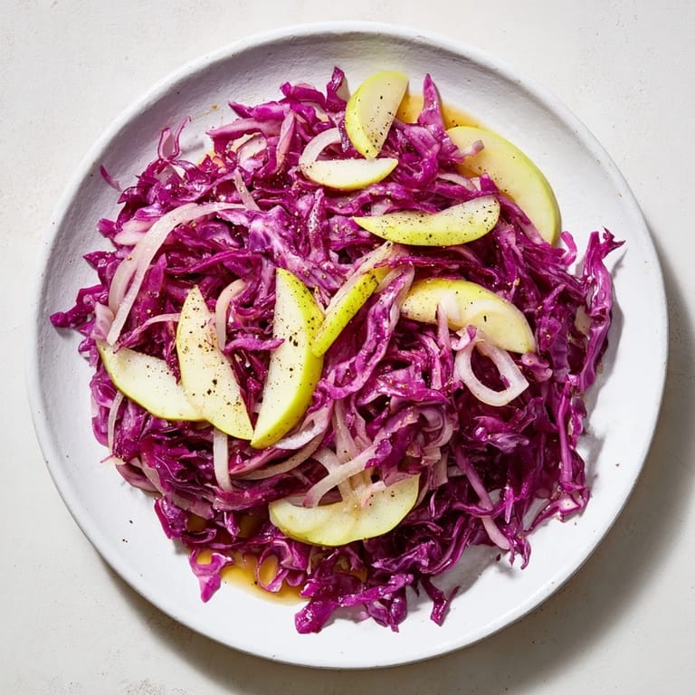 This easy Sweet & Sour Bavarian Red Cabbage and Apple side dish features a sweet and tangy flavor.