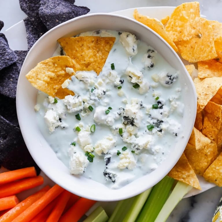 A gorgeous Frozen Pond Blue Dip Platter, perfect for a party, featuring colorful vegetables.