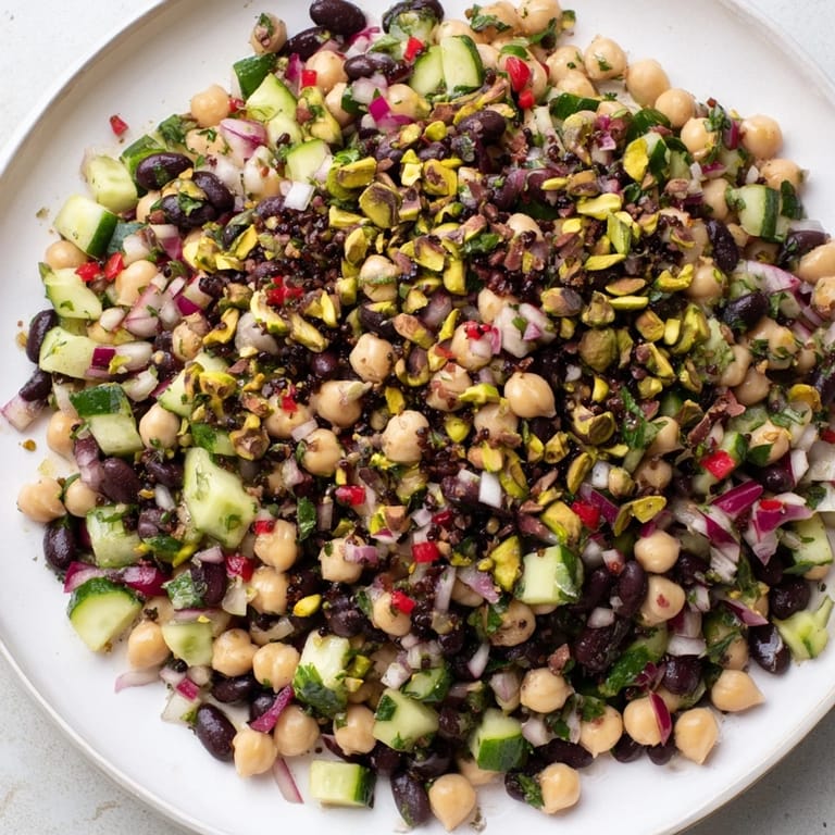 Delicious Dense Bean Salad, a Middle Eastern fusion, with pistachios and rich cocoa flavors.